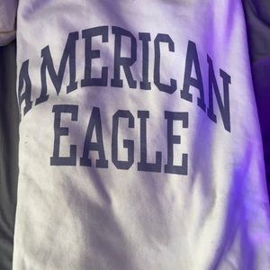 This is a white, American Eagle pull over